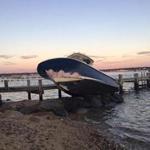 The 26-foot boat crashed ashore after its driver fell out while trying to moor the boat in Vineyard Haven.